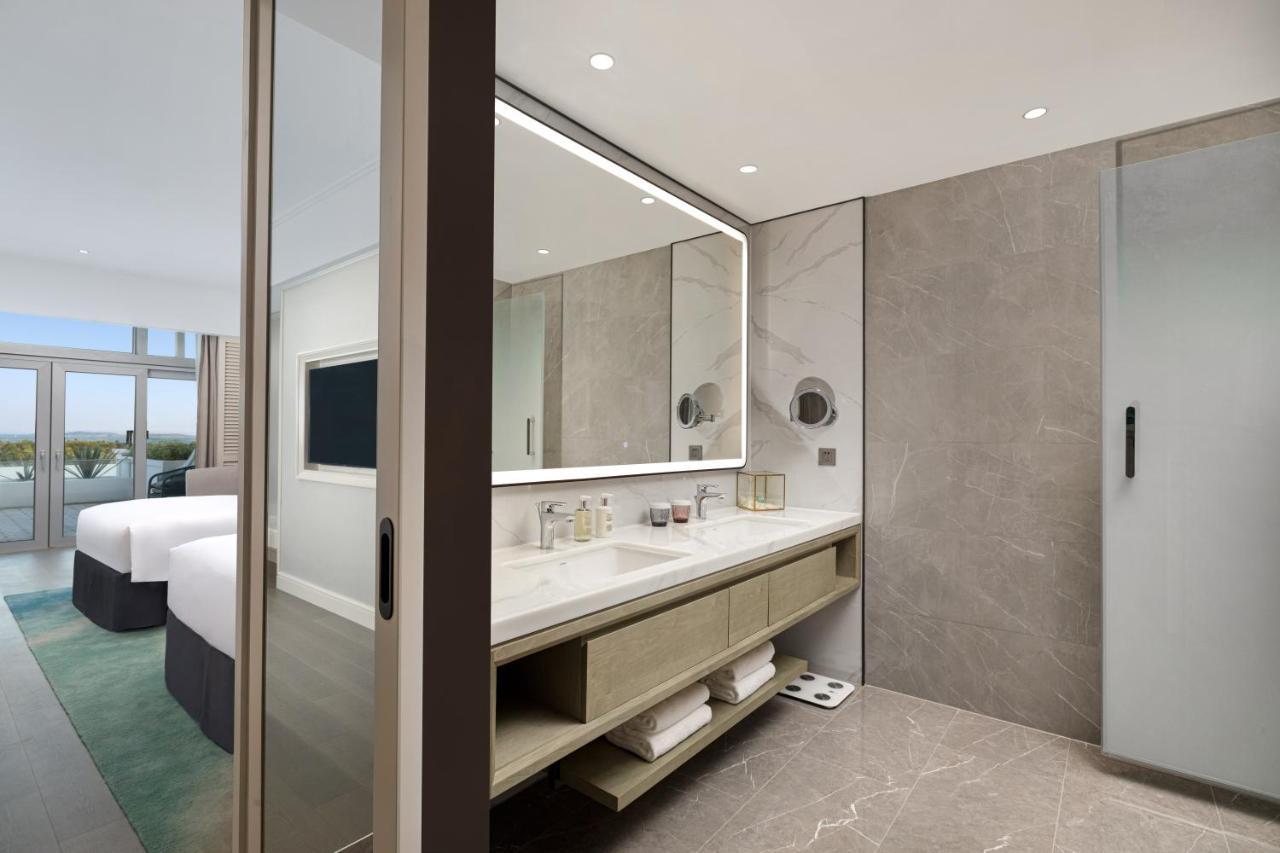Xiamen International Seaside Hotel -Hotel Corridor Leads To The Stone Exhibition Hall Bagian luar foto